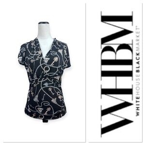 White House Black Market key and tassel print black short sleeve top size med